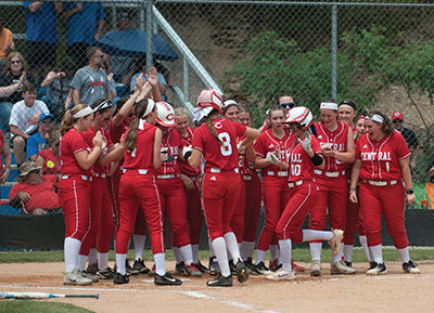 Lexi Haddix gets greeted at the plate
